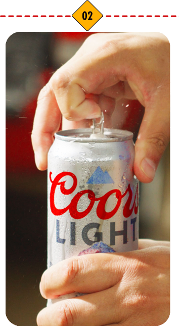 A can of Coors Light been being opened.