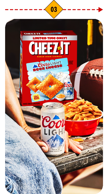Cheez-It Coors Light box on a tialgate with Coors Light can and football.
