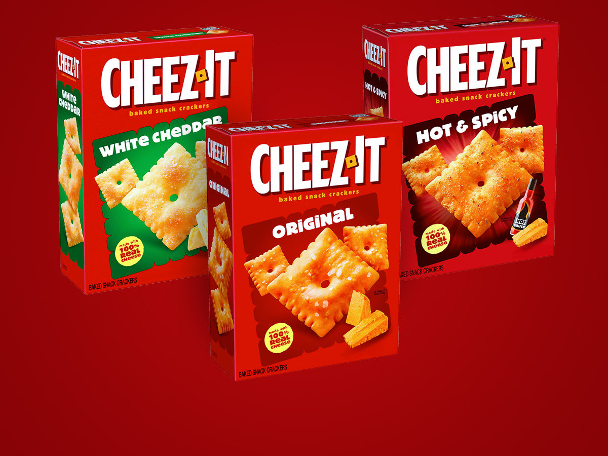 Three Cheez-It boxes on a red background